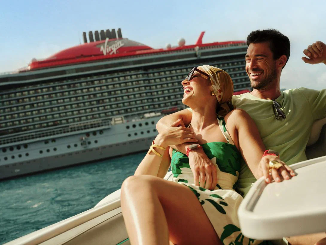 A couple relaxing in the Caribbean with Virgin Voyages