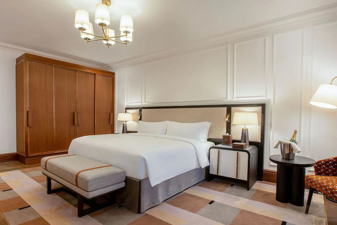 Bright, modern luxury suite with king-sized bed