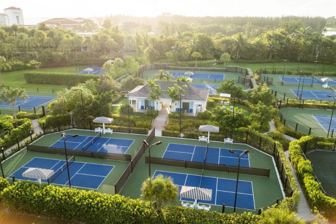 (credit: Nassau & Paradise Island Promotion Board) Tennis courts from a birds-eye view surrounded by trees
