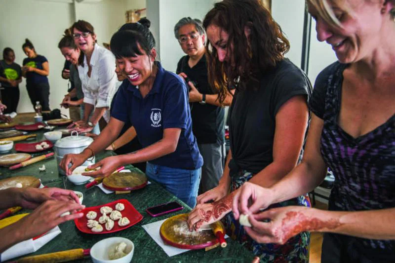G Adventures works with SASANE to offer clients local cooking classes in Nepal