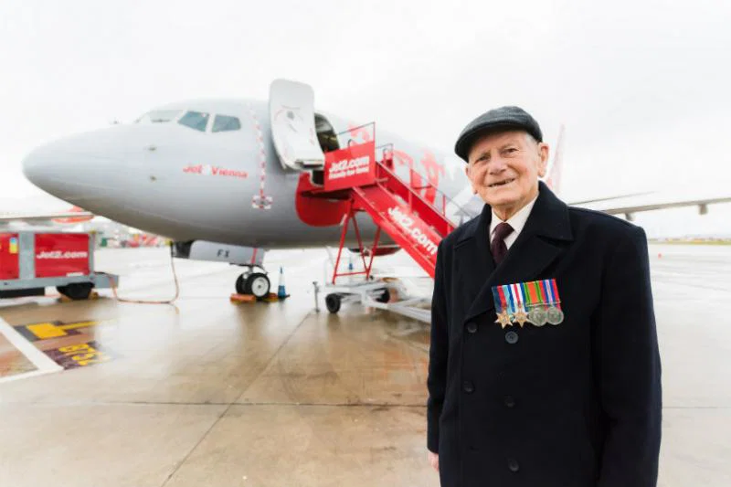 Eddie Morrison, a Second World War veteran, outside the Boeing 737-800 NG