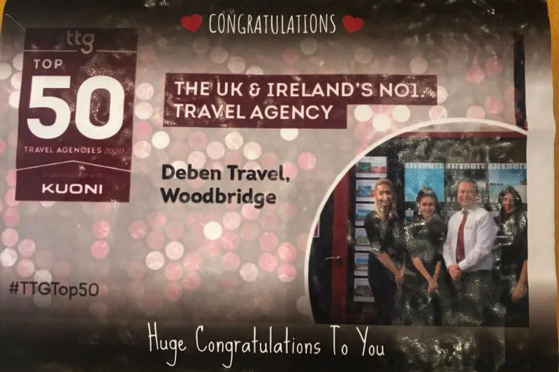 Deben staff received a Top 50-themed cake from a customer to celebrate their win