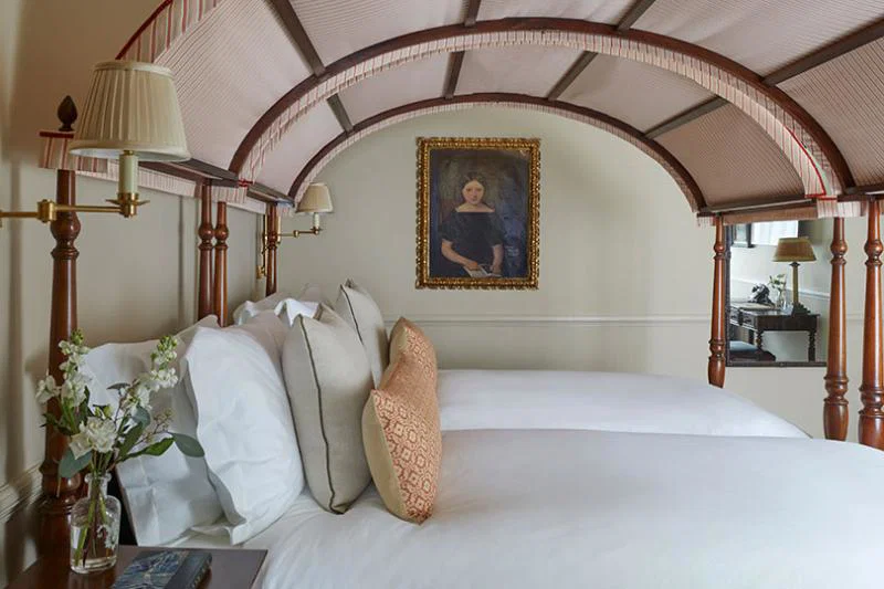 Campaign furniture features in some of the rooms