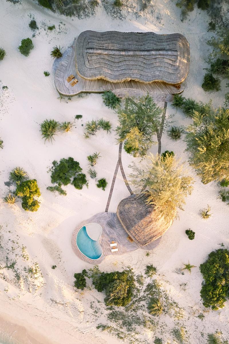 One of the island resort's bungalows, set among sand dunes