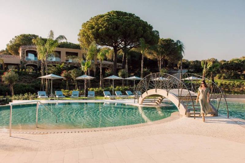 The resort offers a pool, gym and outdoor tennis courts