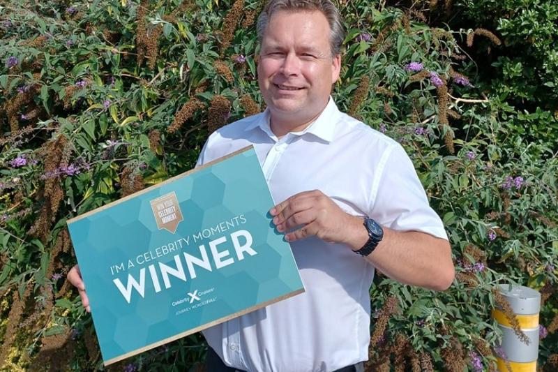 Deben Travel owner Lee Hunt celebrates after his Celebrity Moments win