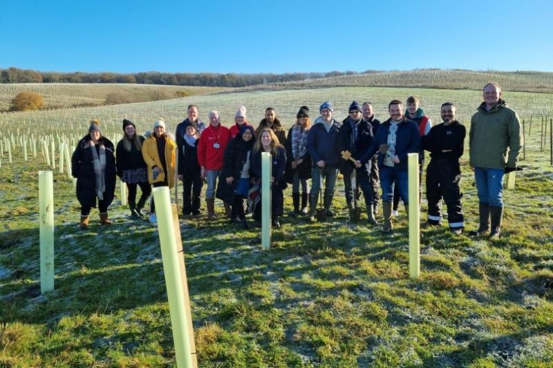 Volunteers plant trees, part of Luton airport's sustainability drive