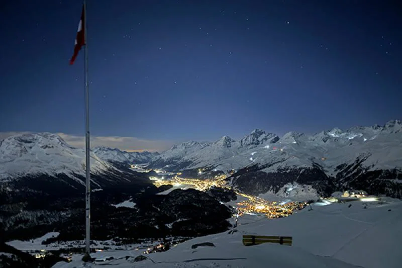 The views over Switzerland's Engadin Valley during moonlight snowshoeing are breathtaking