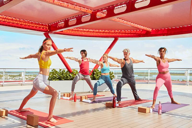 Sailors can join a yoga class at The Perch, a serene top-deck outdoor space